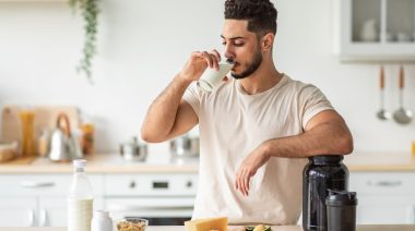 Athlete drinking a meal replacement shake.