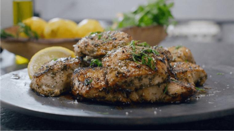 A plated grilled chicken meal.