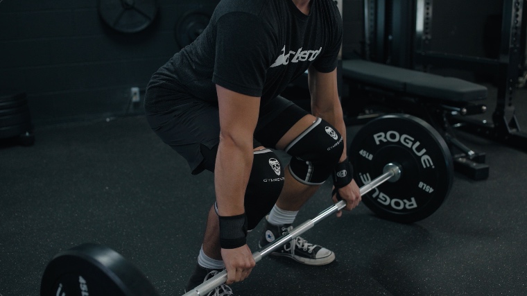 Jake Setting Up for a Power Clean with the Gymreapers Knee Sleeves