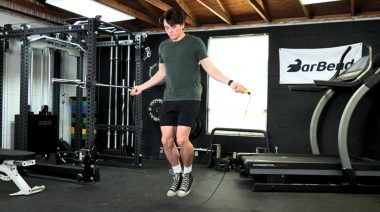 Jake doing a jump rope workout in the gym.