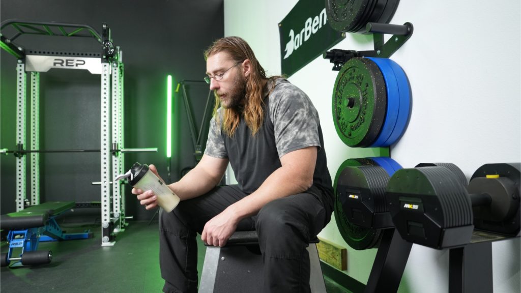 A BarBend tester sipping a mass gainer shake.