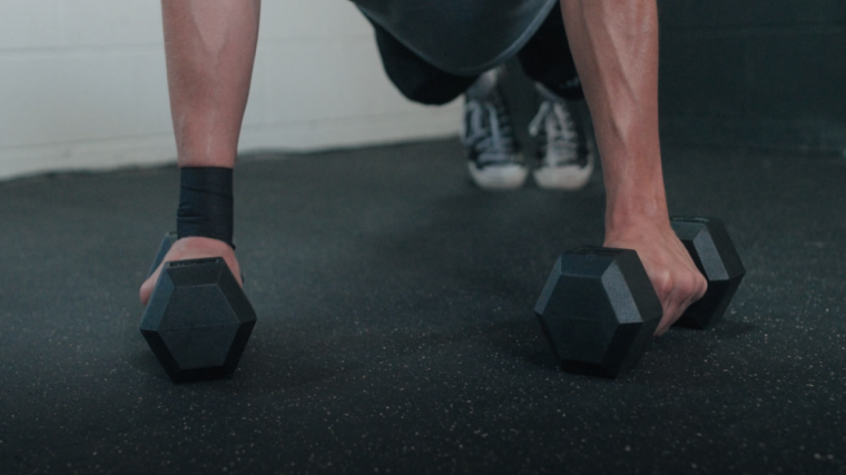 Jake Using the Living.Fit Dumbbells for Pushups