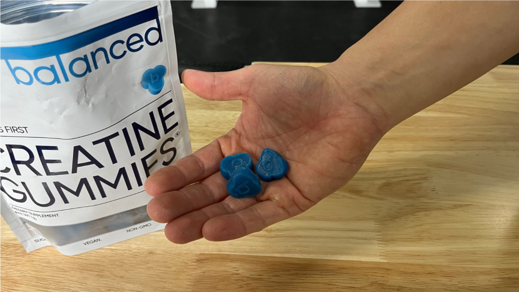 A BarBend tester with a handful of Bear Balanced Gummies